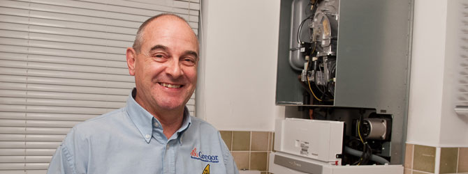 heating engineer with boiler